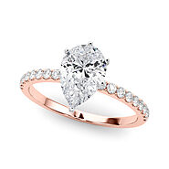 Rose gold Pear Solitaire Diamond Pavé Band with Four-Prong Setting