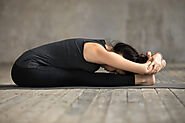 5. Paschimottanasana (Seated Forward Fold)