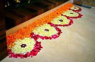 Unique Flower Rangoli Designs with Diya for New Year