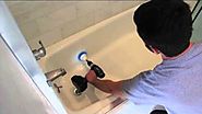 Scrub Your Bathtub and Shower in Minutes with a Cordless Drill