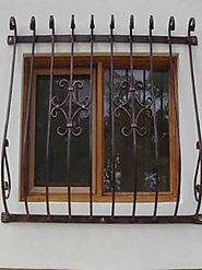 Stylist collection of wrought iron doors