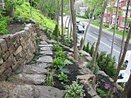 How to Build a Natural Stone Retaining Wall the Right Way!