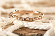 Twig ring with scattered diamonds in 14kt gold