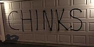 Asian Family Finds 'Chinks' Painted Across Garage Door After Moving To New Home