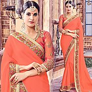 Orange Saree With Round Necked Open Back Broad Lace Bordered Blouse