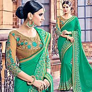 Party Wear Georgette Saree With Three Four Sleeves Round Necked Blouse