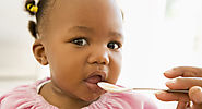 Age-by-age guide to feeding your baby | BabyCenter