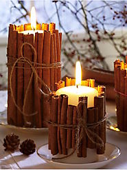 Pillar candles wrapped in cinnamon sticks - Decoist
