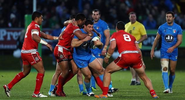 Tonga's defensive display eliminates Italy