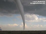 Awesome footage of tornado forming and touching ground