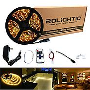 RoLightic LED Strip Light 16.4ft 300leds Warm White 3000K 3528 Led Tape Lights Full Kit with RF Remote Dimmer & 2A Po...