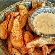 Potato Wedges with Cheese sauce