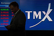 TSX edges lower as banks, metals weigh
