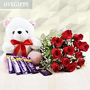 Bunch of 12 Red Roses with 12 Inch Teddy & 5 Dairy Milk Chocolates