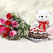 Buy Adelicious, 1 Pound Blackforest cake, 10 beautiful red roses and a lovable teddy bear 6 inch. - OyeGifts.com