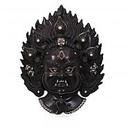 Website at https://www.craftvatika.com/large-mahakala-black-mask-himalayan-tibetan-art-wall-hanging.html