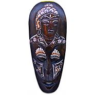 Website at https://www.craftvatika.com/wooden-african-tribal-face-wall-mask-with-buddha-handpainting.html