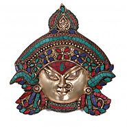 Website at https://www.craftvatika.com/durga-shakti-brass-wall-hanging-indian-goddess-kali-maa-wall-mask.html