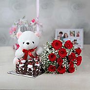 A Bunch of 12 Red Roses with Half Kg Black Forest Cake and Teddy Bear