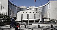 China central bank announces surprise cut in bank reserve requirements
