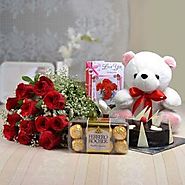 12 Red Roses & Teddy With Ferrero Rocher & Half Kg Chocolate Cake