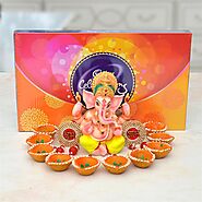 Website at https://www.oyegifts.com/diwali-hamper-mukut-ganesh-idol-diya-cadbury-celebration-with-diya-hampers