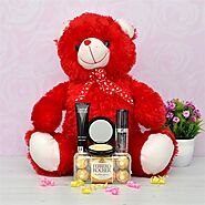 Website at https://www.oyegifts.com/red-teddy-with-chocolates-and-cosmetics