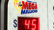 Kansas man claims $50M Mega Millions jackpot on ticket he purchased in Missouri