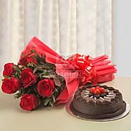 This beautiful bouquet of 10 red roses with 500 grams of delicious chocolate truffle cake - OyeGifts.com