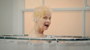 Vivienne Westwood takes a shower in public for Peta - video