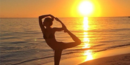 Gisele Bundchen Does Yoga On The Beach At Sunset