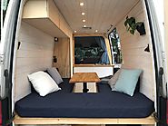Cabincampers campervans are inspired by Norwegian cabins and have a wooden interior.