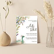 WHITE HANDMADE COTTON PEACOCK THEMED WEDDING INVITATION : C-PEACOCK GREEN - IndianWeddingCards