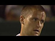 Youzhny reacts badly to losing point - hits his racquet against his head