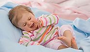 Trẻ sơ sinh ngủ không sâu giấc hay vặn mình gây hậu quả gì?