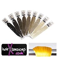 18" Remy stick-tip hair extensions in color vibrant yellow