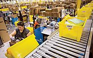 Meet Little Orange Fellows – The Busiest Employees of Amazon Warehouse