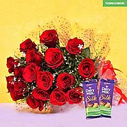 Buy/Send Red Blooms With Chocolaty Treats Online - YuvaFlowers.com