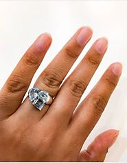 Elegant blue topaz engagement ring