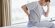 Why is my back pain worse in the morning?