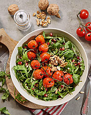 Best Recipes of Olive Oil for Salad - Arugula Salad with pomegranate vinaigrette & nuts Recipe at Bertolli Olive Oil