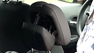 Orange County woman files lawsuit, claims headrest deployed while she was driving