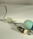 Eco friendly charm chain necklace. Mint, emerald green and blue wood and glass beads, recycled leather,silver colored...