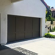 Custom Wood Door by Dyer's Garage Doors