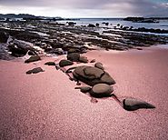 8 Islands That Wear Pink Sand Beaches - Islands and Islets