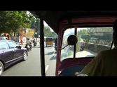 Heavy traffic Chennai Madras India from the viewpoint of a Tuk Tuk