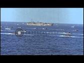 LVTs underway in Pacific Ocean towards Iwo Jima, Japan during World War II. HD Stock Footage