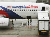 Malaysia vows to track down MH370; authors claim foul play