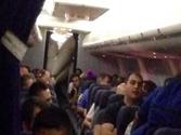 Evacuation slide deploys on United flight