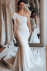 Website at https://www.jolilis.com/products/one-shoulder-mermaid-wedding-dress-with-chapel-train-chiffon